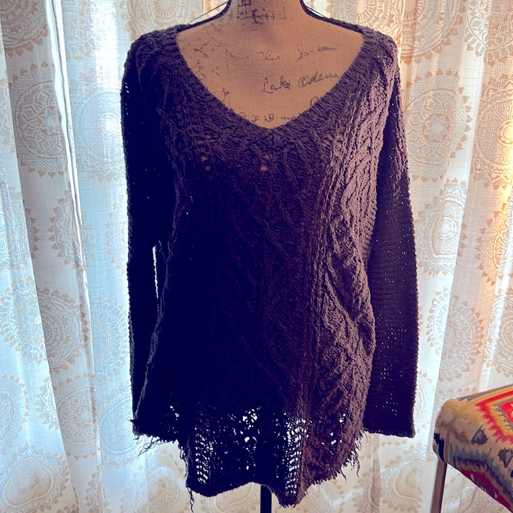 Worn once size medium. Free People distressed sweater.